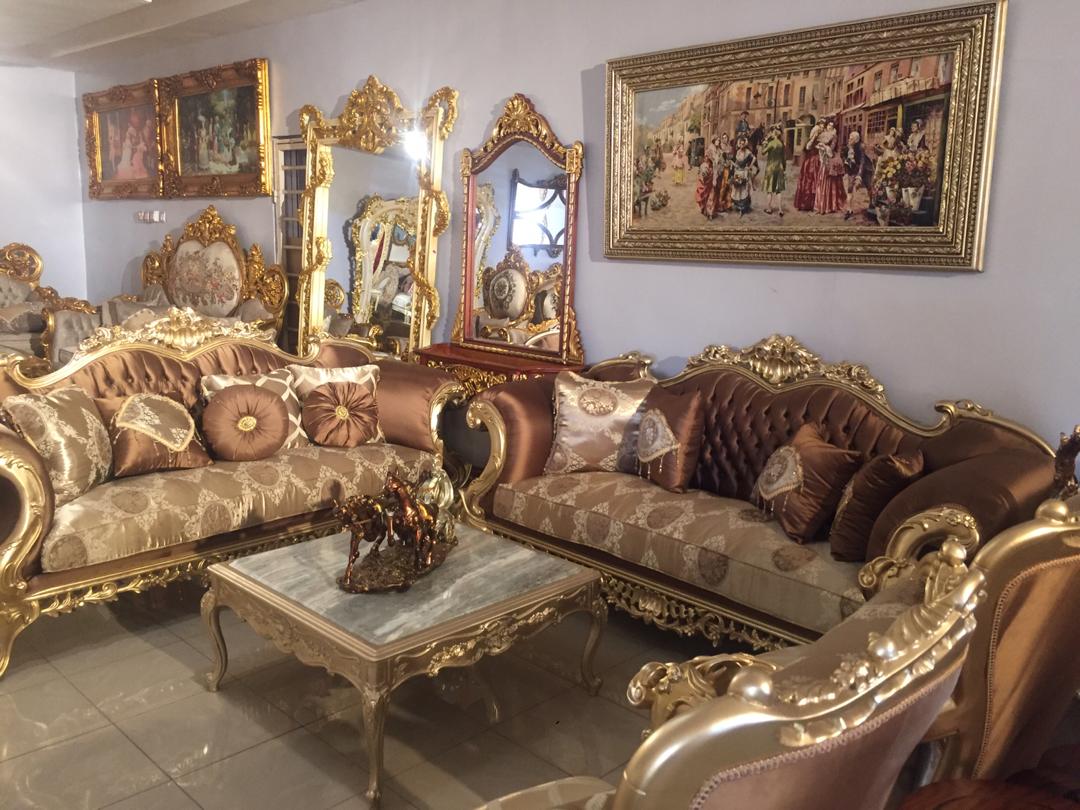 Modern gold tree sculpture in a living room